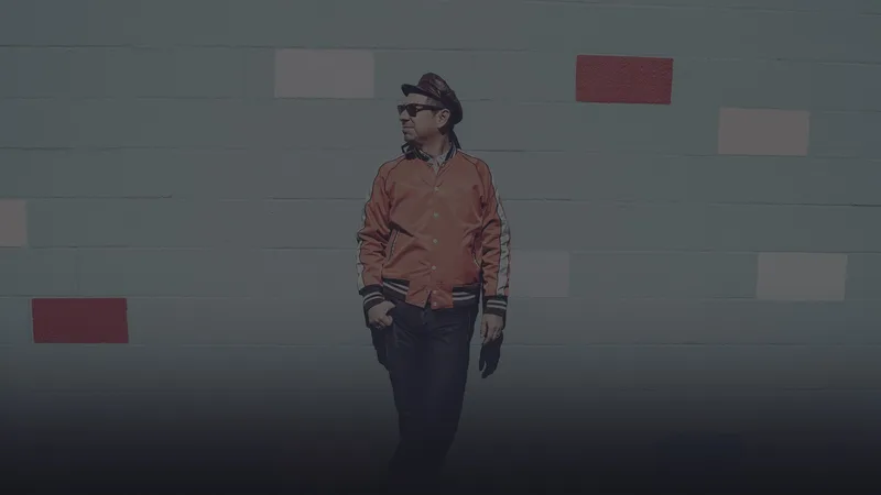 Episode 77: Adrian Quesada - Feature Image