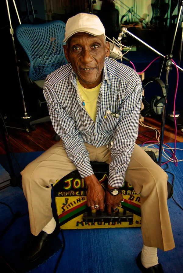 Albert playing a rumba box